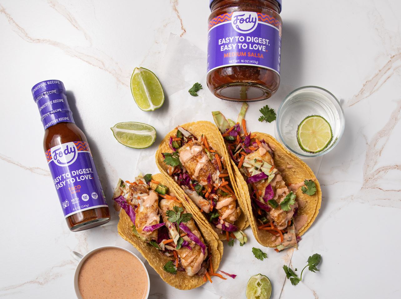 Fody’s Baja Fish Tacos with Creamy Lime Taco Sauce + Salsa Slaw