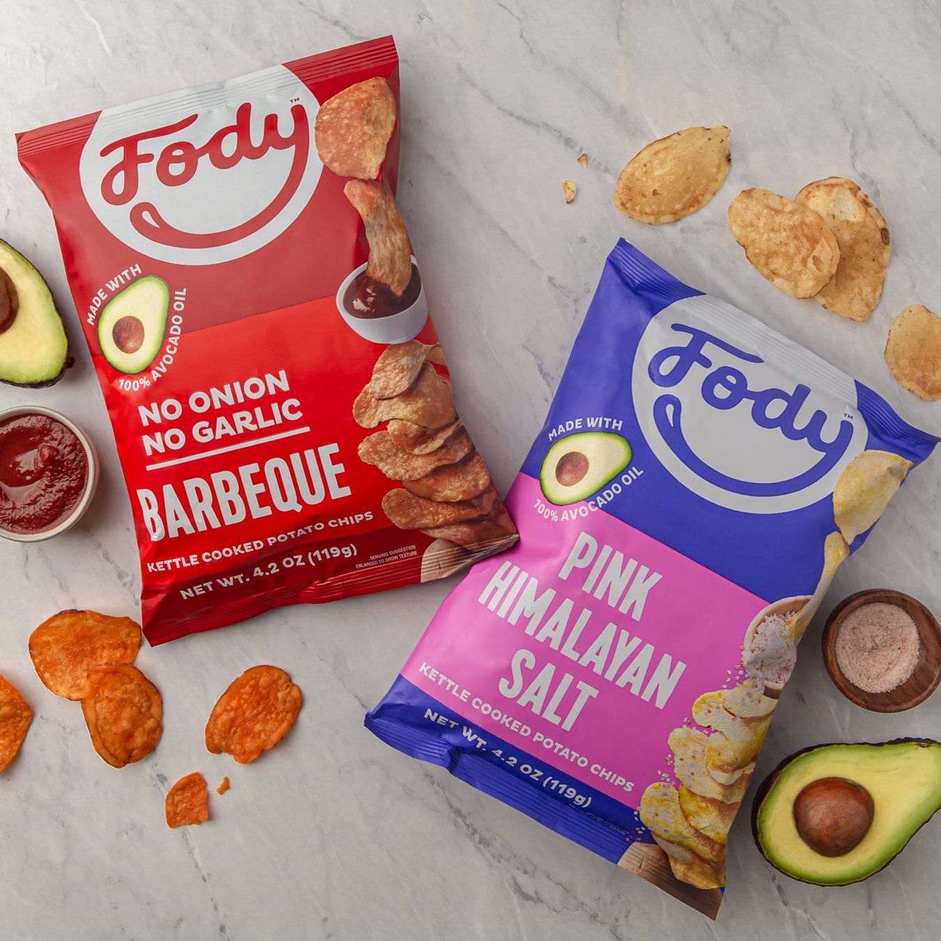 fody low fodmap bbq chips and fody low fodmap pink himalayan salt kettle chips with 2 avocado halves