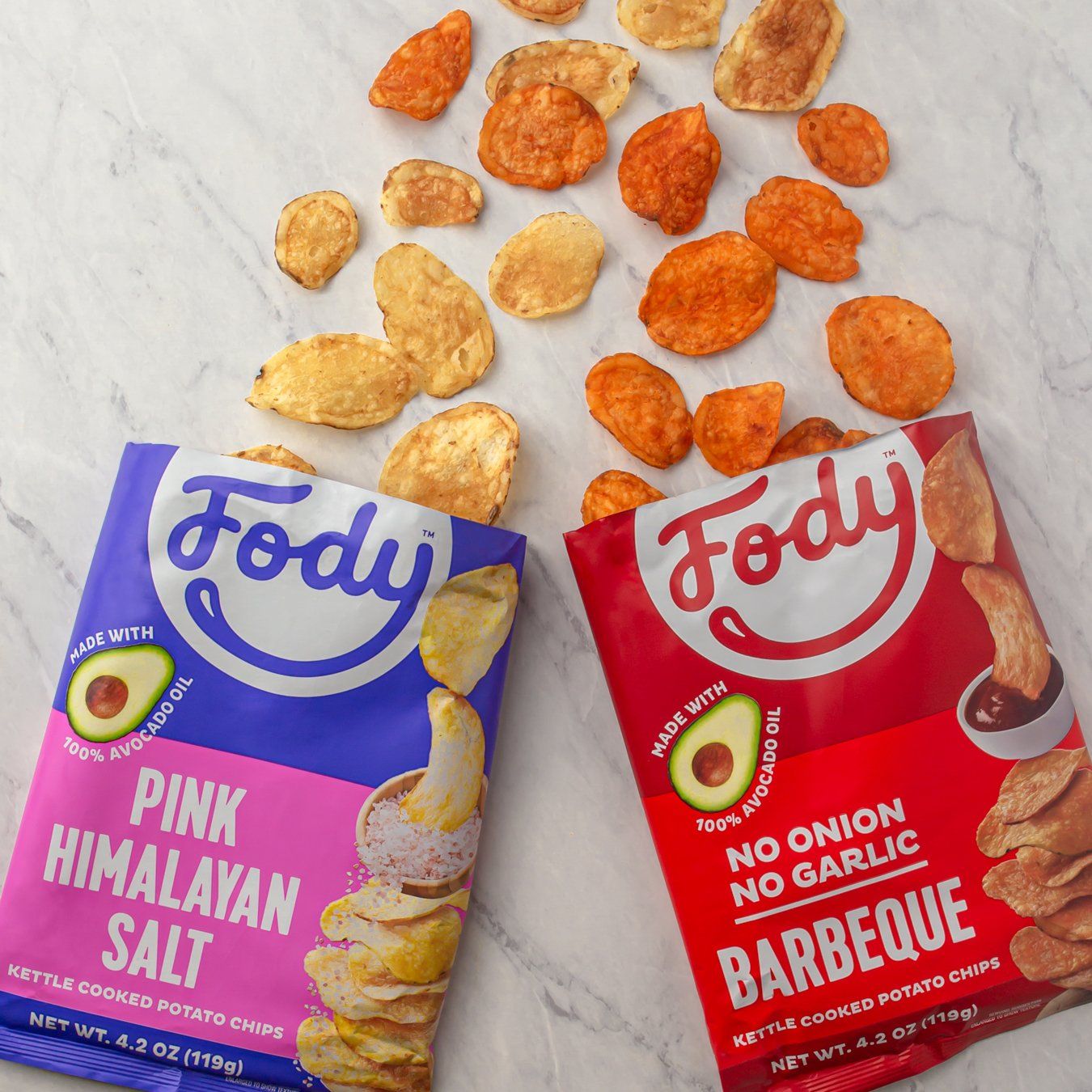 fody pink himalayan salt and fody bbq chips with chips coming out of bag